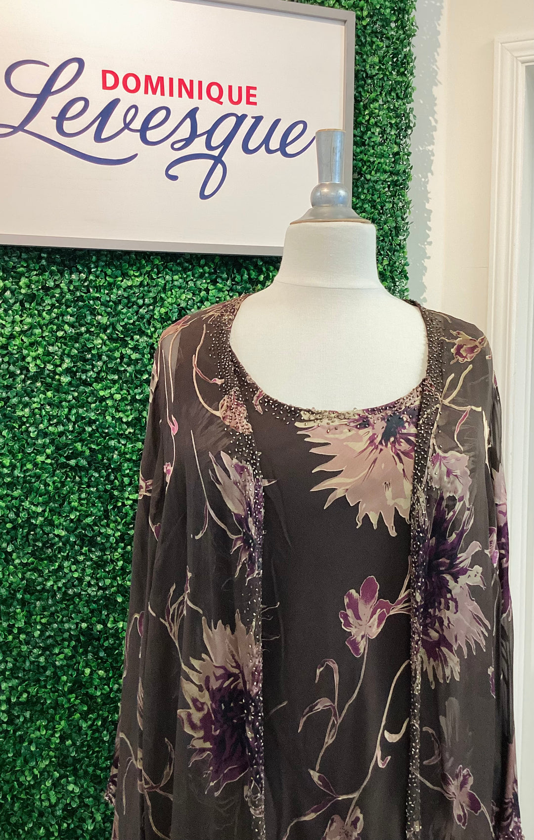 Floral dress on a mannequin with &