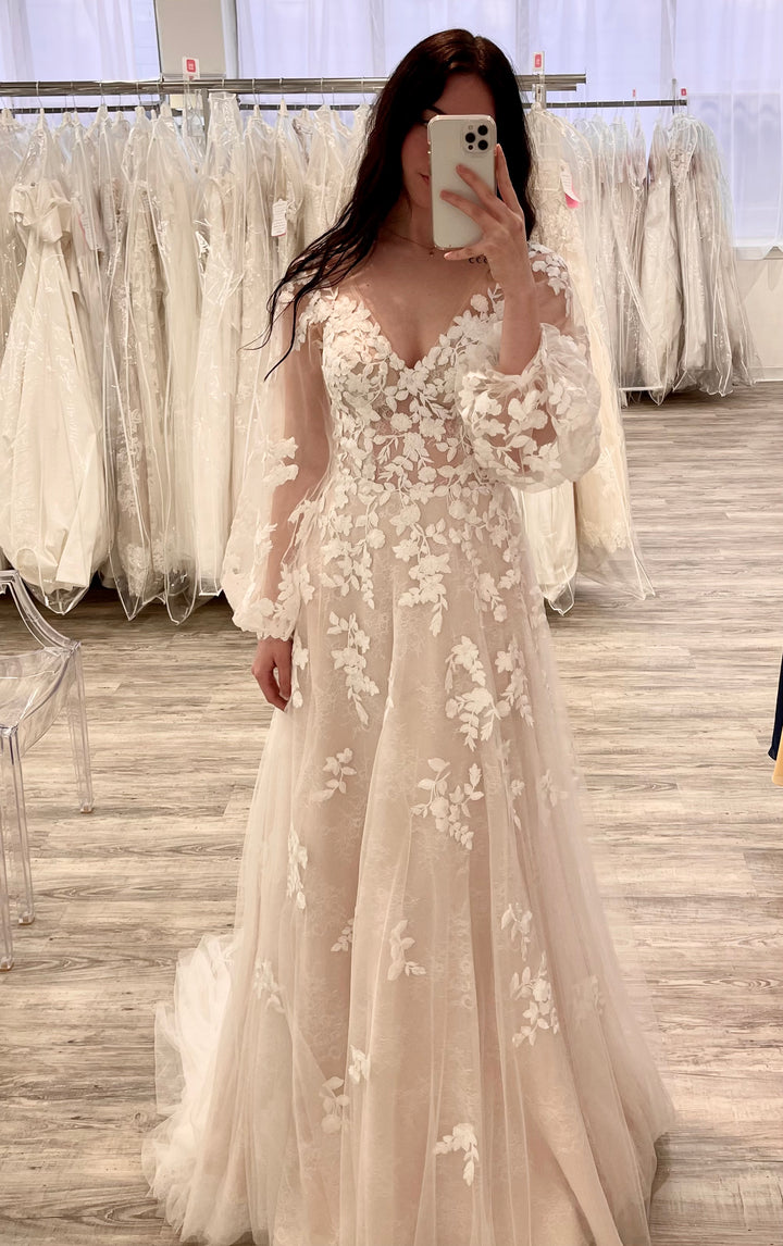 Women taking a selfie in the Muscat wedding dress