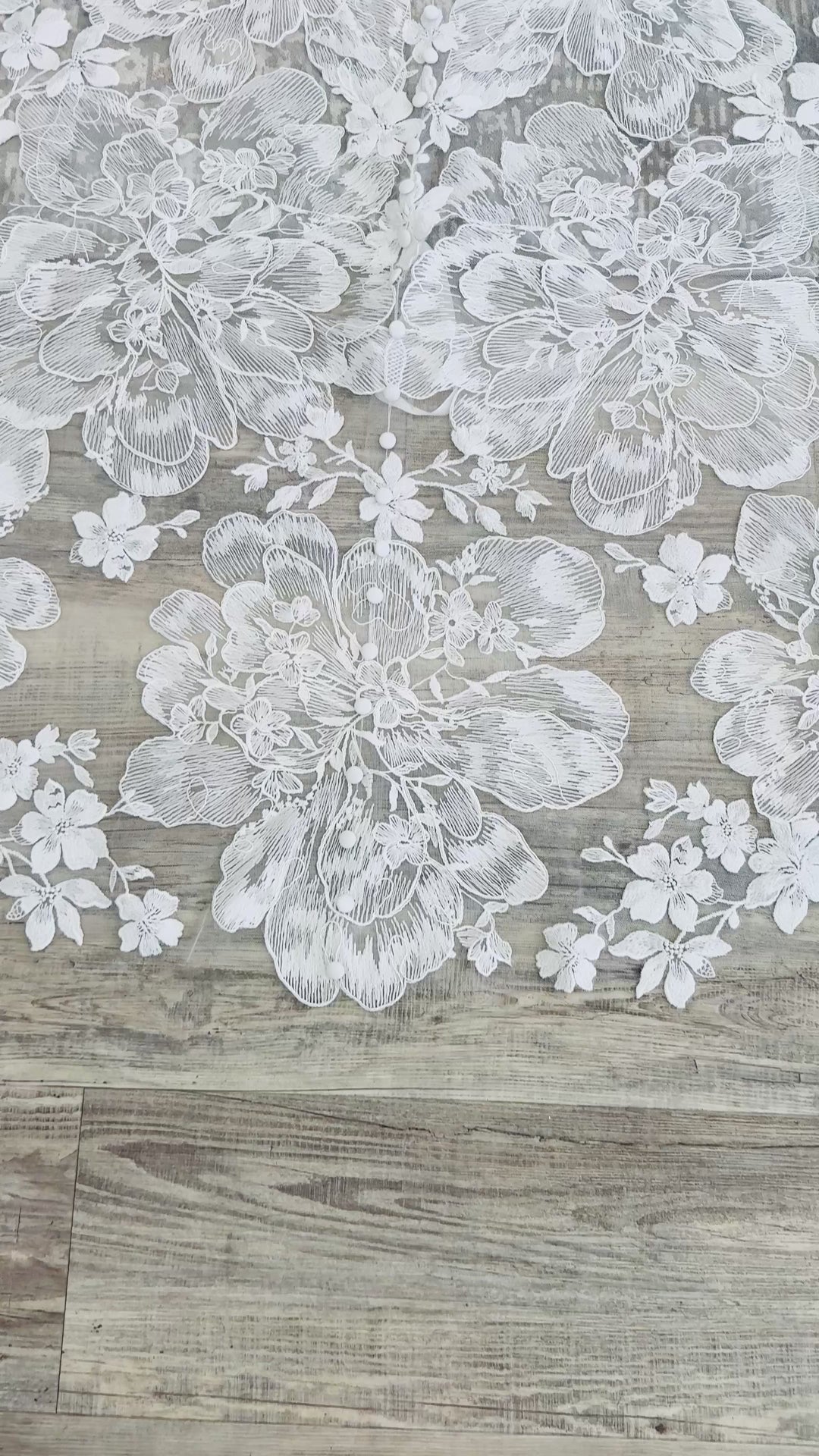 Video showing the lace train in the back of the Coco wedding dress 